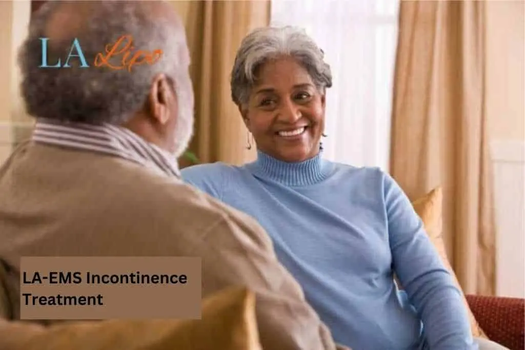 Couple sat smiling at each other - LA-EMS treatment Stratford New Town
